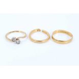 Two 22ct gold wedding rings and 18ct gold two stone diamond crossover ring (3)