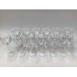 Twelve Waterford Crystal hock glasses and thirteen liqueur glasses