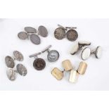 Six pairs of silver cufflinks