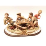 Very large Capodimonte figural group - 'cheats card game', on wooden plinth