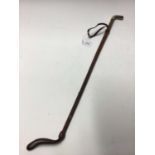 Leather riding crop with silver golf club head