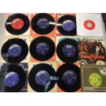 Carrying case of 100 single records including Troggs, Small Faces, Them, Headm Fleetwood Mac, Free,