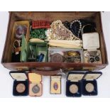 Vintage suitcase containing costume jewellery and bijouterie