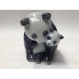 Royal Copenhagen porcelain ornament of a panda with cub, model 666.