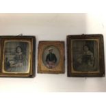 Small group of pens together with three ambrotype photos