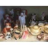 Collection of Staffordshire spaniels together with Doulton figures and character jugs and teawares,