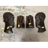 Group of four 1950s African carved wood figures