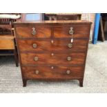 George III mahogany chest of two short and three long drawers with brass ring handles, on bracket fe