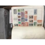 Eight stamp albums, world stamps, and a collection of loose stamps