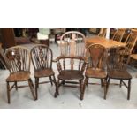 19th century Windsor elbow chair and a set of four Windsor wheel back kitchen chairs with solid seat