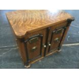 Good quality Edwardian oak table cabinet, in the form of a safe, with three short drawers enclosed b