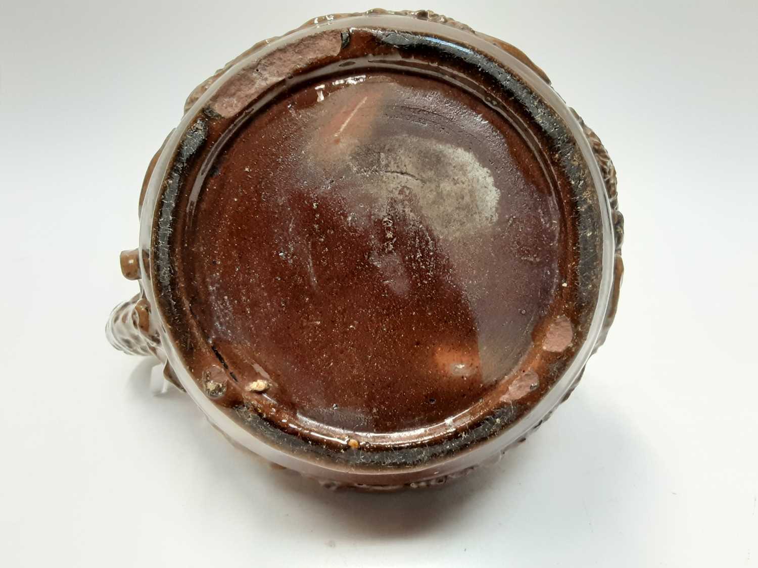 Castle Hedingham Edward Bingham brown glazed pottery jug, with lion on handle and mask decoration, 2 - Image 6 of 6