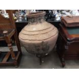 Large terracotta garden pot on wrought iron stand, approximately 110cm high