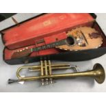 Late 19th century Italian mandolin in original case and a Boosey & Hawkes "78" trumpet