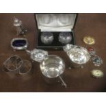 Group of silver and jewellery items including cream jug, christening cup (possibly Indian) napkin ri
