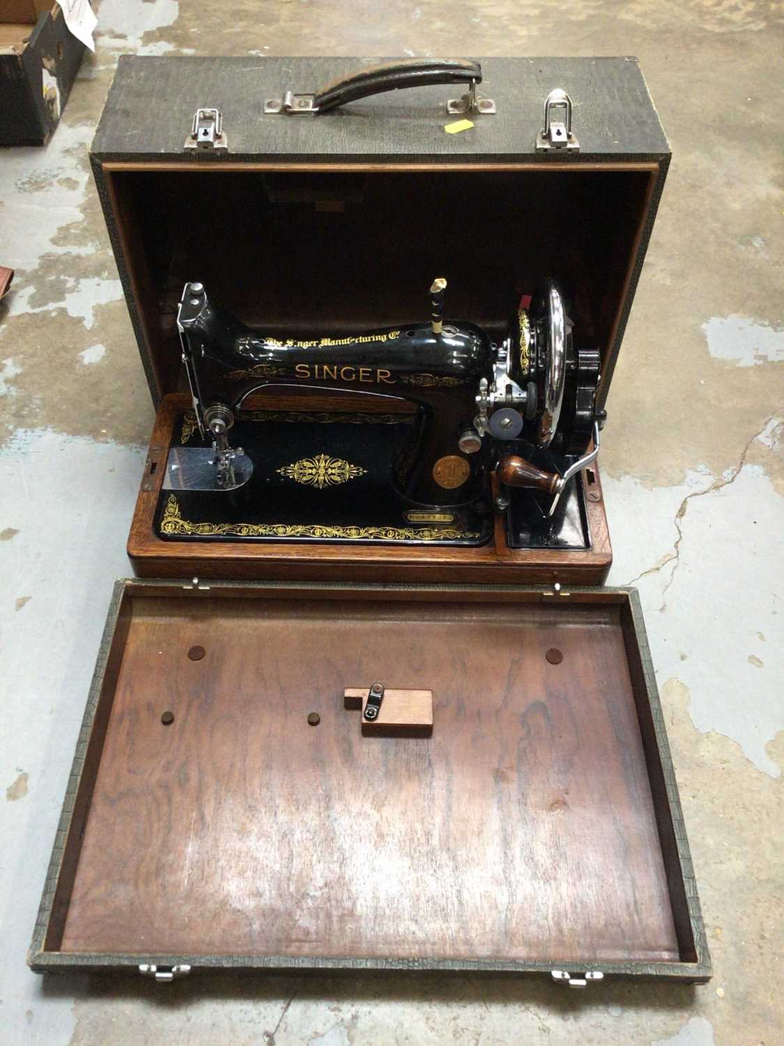 Two cased sewing machines, including a Singer and an Ideal Vollzickzack