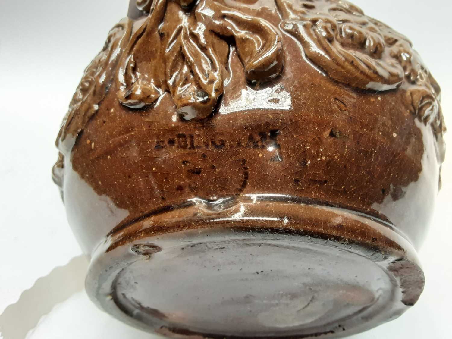 Castle Hedingham Edward Bingham brown glazed pottery jug, with lion on handle and mask decoration, 2 - Image 5 of 6
