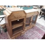 Good quality Art Deco carved bling oak dwarf bookcase, with acorn motifs, 114cm wide x 31cm deep x 9