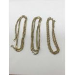 Two lengths of Victorian yellow metal snake link chains and a yellow metal necklace