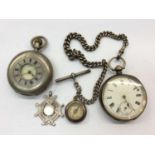 Silver cased pocket watch on silver chain with compass fob, one other silver cased half hunter pocke