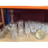 Selection of cut glass, decanter, storage jars, bell and plain liquor glasses plus match striker