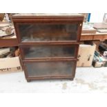 Oak three section Globe - Wernicke bookcase, with label to interior