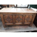 Small 17th century style carved and panelled oak coffer