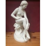 19th century Parian porcelain sculpture of seated female nude, approximately 38cm.