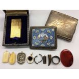 Dunhill gold plated lighter in case, Eastern enamelled cigarette case, one white metal cigarette cas