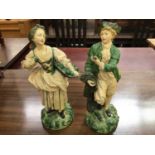 Pair of painted plaster figures