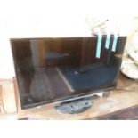Samsung television model number T28D310EW with remote control