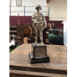 Military interest: white metal figure of a Royal Anglian Officer, on plinth base with engraved silve