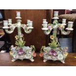 Pair of early 20th century German porcelain candelabra mounted with cherubs
