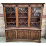 Good quality Georgian style mahogany concave fronted two height with three astragal glazed doors abo
