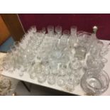 Quantity of glassware, including sets of crystal glasses, candlesticks, decanters, etc