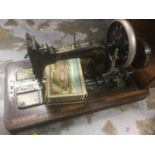 Early 20th century sewing machine in walnut and marquetry case