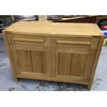 Contemporary light oak sideboard with two draws above two panelled doors
