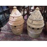 Two terracotta pots, 79cm high