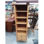 Contemporary beech effect bookcase with adjustable shelves and two drawers below, 54cm wide, 33cm de