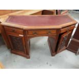 Good quality late Victorian/Edwardian carved walnut kneehole desk with leather lined top, three draw