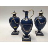 Garniture of three Wedgwood vases and covers
