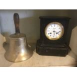Slate clock, together with a large hand bell