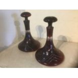 Pair of antique purple cut glass ships decanters and stoppers