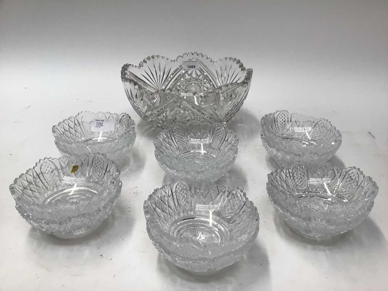 Good quality cut glass bowl, 25cm diameter and a set of 10 similar smaller bowls