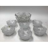 Good quality cut glass bowl, 25cm diameter and a set of 10 similar smaller bowls
