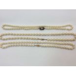 Three single strand cultured pearl necklaces