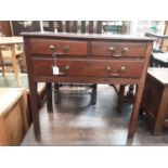 George III mahogany mahogany lowboy with two short and one long drawer with brass swan neck handles