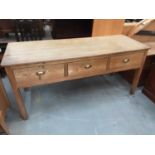 Nineteenth century pine dresser base with three drawers on square legs, 180cm wide, 66cm deep, 82.5c