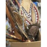 Large quantity of tribal items - headdresses, spears etc