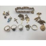 Group of gold and yellow metal jewellery to include a 9ct gate bracelet, 9ct gold cross pendant, loc